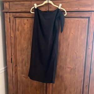 Black Jennie Kayne side tie skirt with side slit. Midi length.